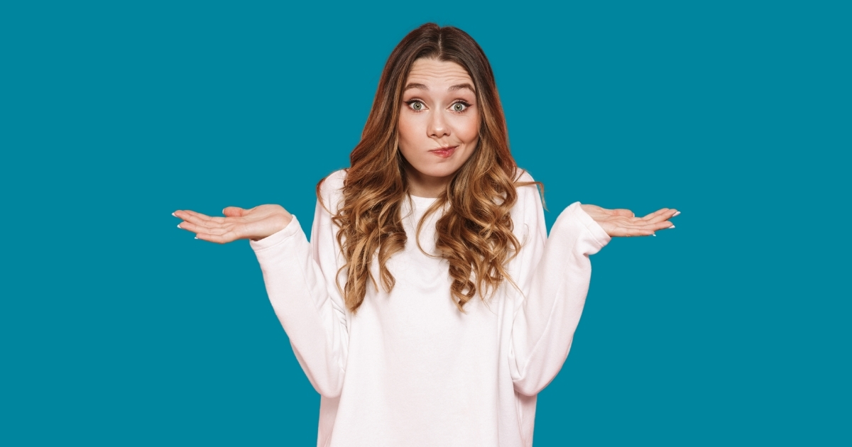 Woman shrugging against a teal background, representing uncertainty about what happens after marketing generates a customer enquiry.